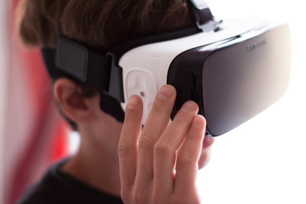 Image of a guy using the built in touchpad of the Samsung Gear VR